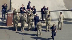 American men's hockey stars share their gold medals with soldiers before their visit to the White House