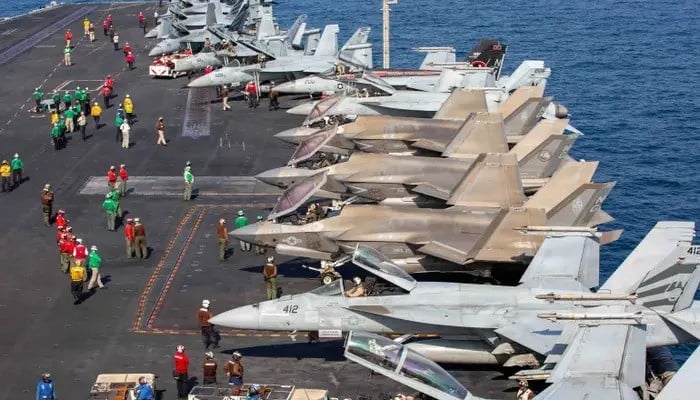 Planes sit on the flight deck of the U.S. Navy's Nimitz-class aircraft carrier USS Abraham Lincoln in support of the Operation Epic Fury attack on Iran, February 28, 2026. — Reuters