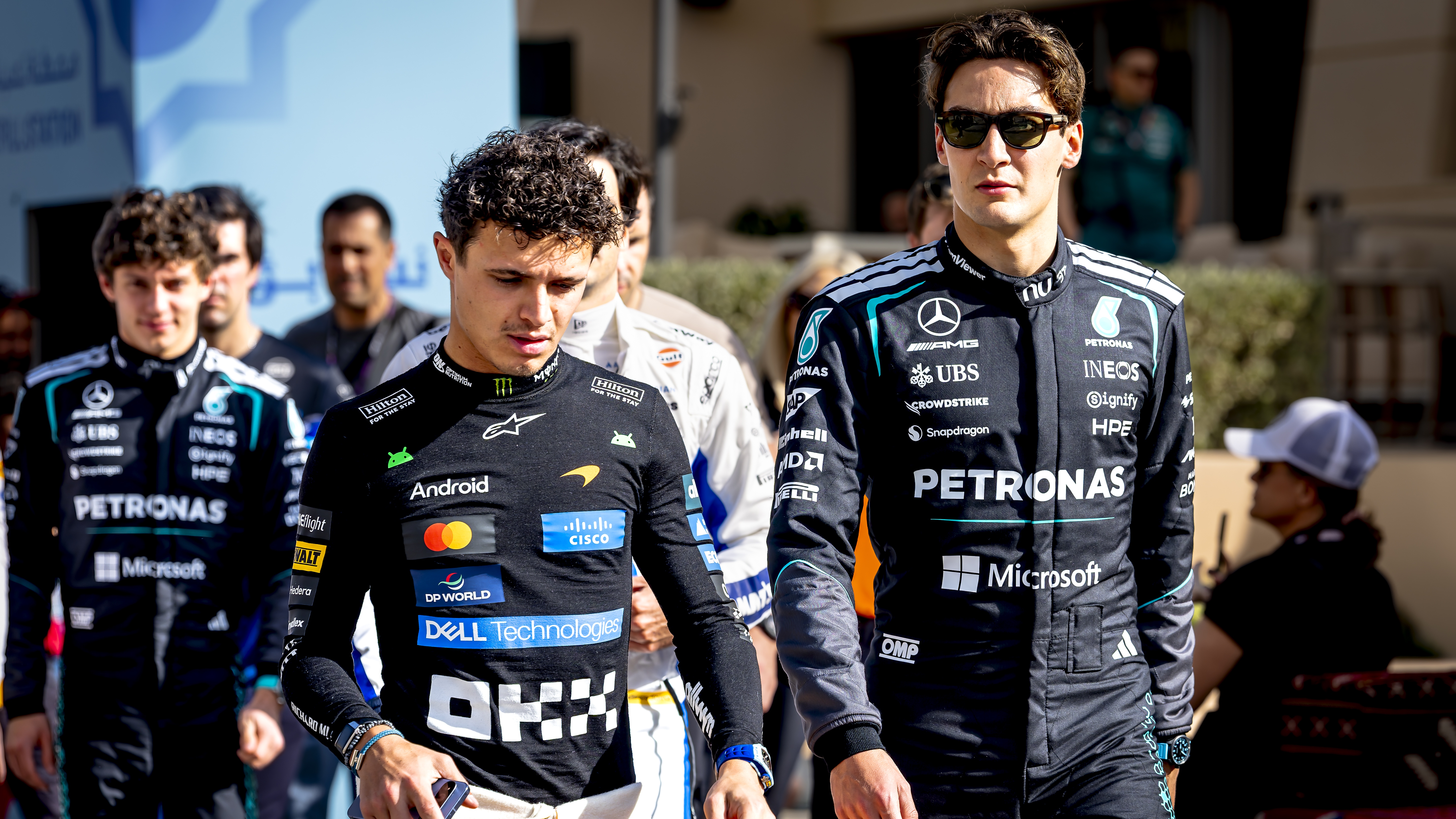Formula 1 driver Lando Norris of the McLaren Mastercard Formula 1 team and Formula 1 driver George Russell of the Mercedes AMG-Petronas Formula 1 team take part in the Formula 1 pre-season testing at the Bahrain International Circuit for the 2026 season in Sakhir, Bahrain, February 12, 2026.