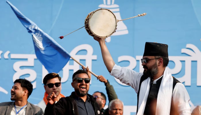 Balendra Shah, former mayor of Kathmandu better known as Balen, who party officials say will become prime minister under an internal deal if the Rastriya Swatantra Party (RSP) wins the March 5 elections, plays a damru percussion instrument during an election campaign in Janakpur, Nepal, January 19, 2026. — Reuters