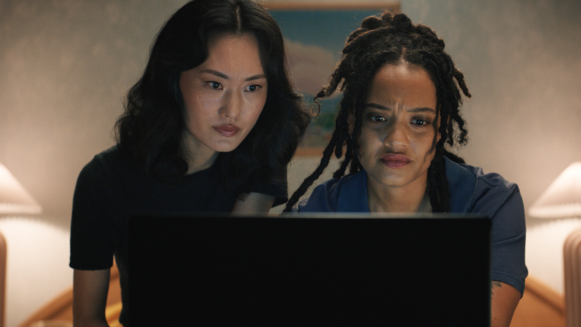 Keiko and May look at a laptop in Monarch: Legacy of Monsters season 2 episode 4