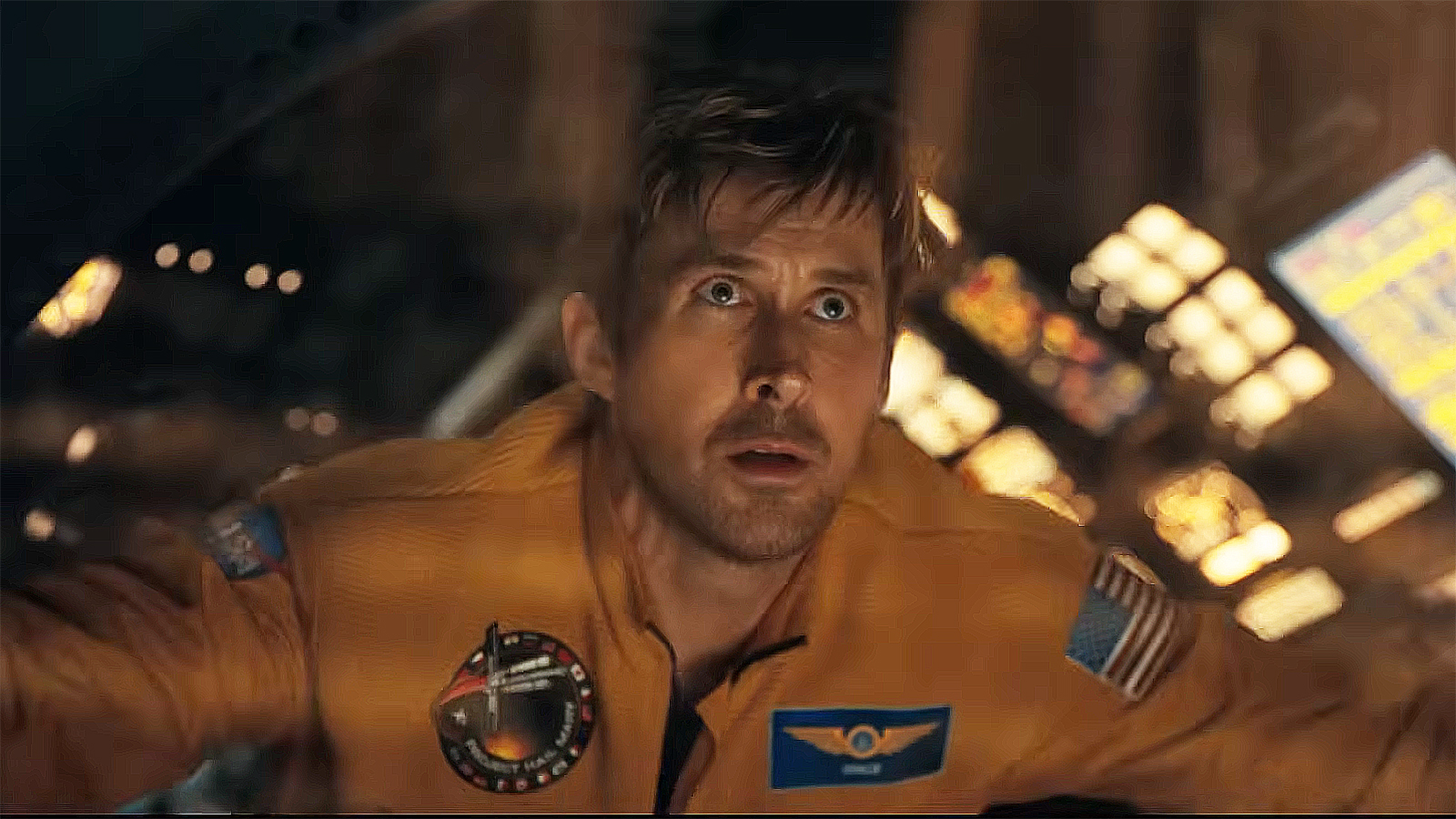 Ryan Gosling's Ryland Grace looks out a spaceship window and into space in the Hail Mary Project