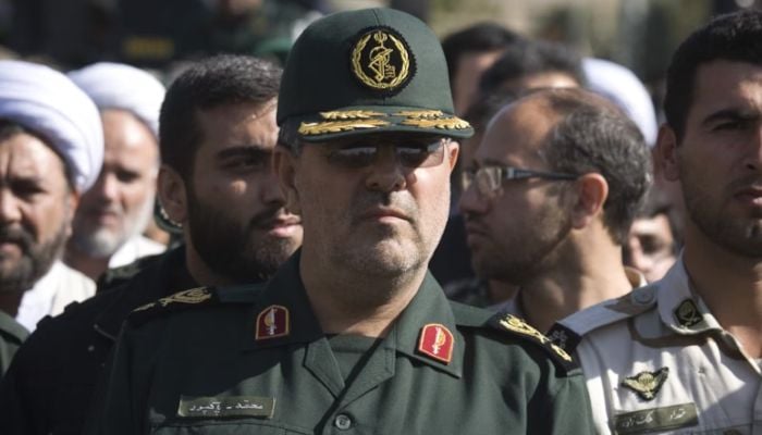 The head of Iran's Revolutionary Guards ground forces, Mohammad Pakpour (center), attends a funeral ceremony in Tehran, October 20, 2009. — Reuters