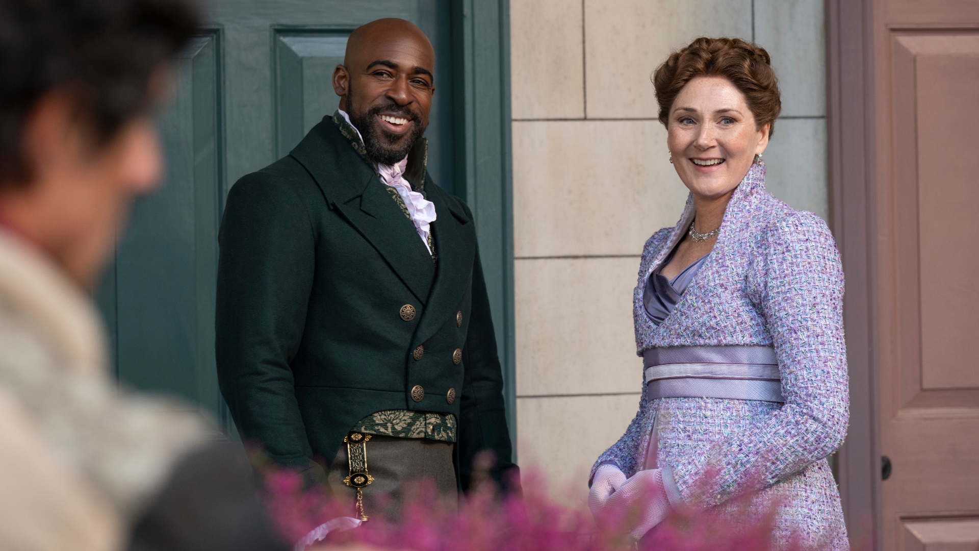Violet Bridgerton and Lord Marcus Anderson smile in season 4 of Bridgerton