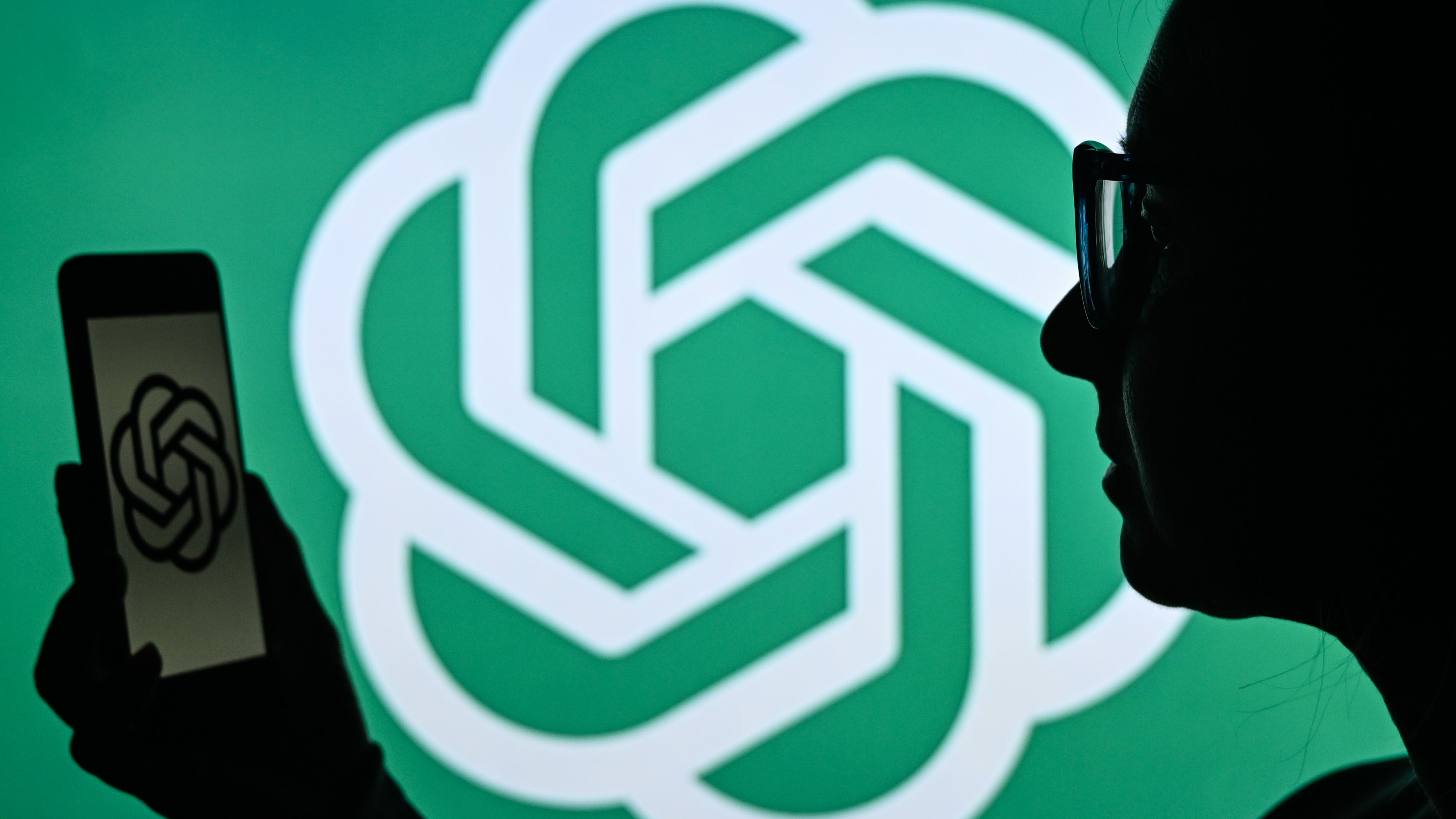 ChatGPT log with a person in the foreground.