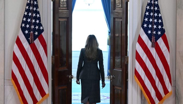 United States First Lady Melania Trump leaves after a speech in the Cross Hall of the White House in Washington, DC, United States, April 9, 2026. — AFP