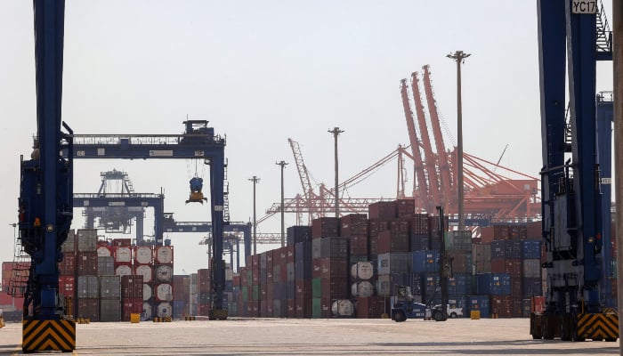 A photo taken March 1, 2022 shows a view of cranes and shipping containers on a loading dock at the Islamic seaport of Jeddah on Saudi Arabia's west Red Sea coast. -AFP