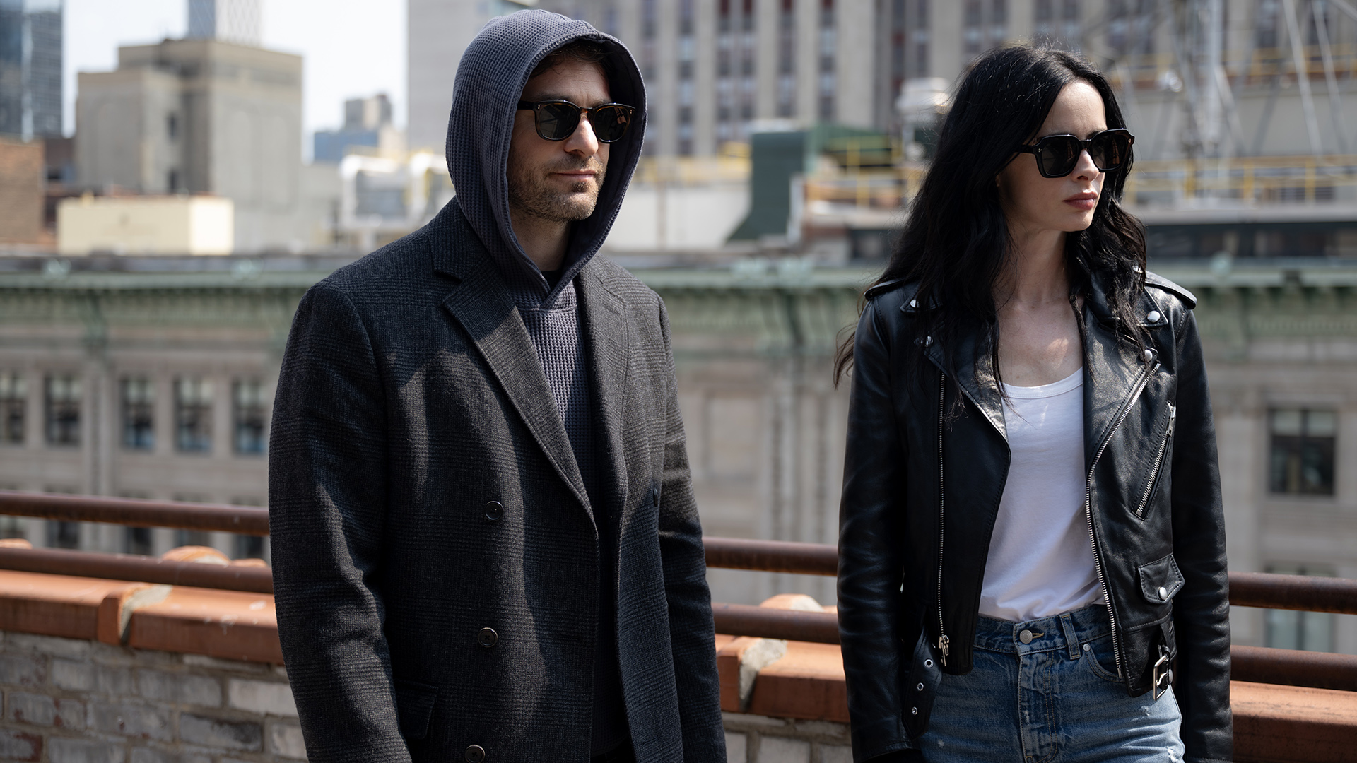 A hooded Matt wearing sunglasses standing next to a Jessica Jones wearing sunglasses in Daredevil: Born Again season 2 episode 7