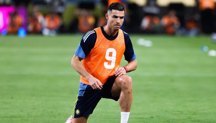 Nassr's Portuguese striker No. 07, Cristiano Ronaldo, warms up before the Saudi Pro League football match between Al-Nassr and Al-Hilal at the King Fahd Sports City stadium in Riyadh, May 12, 2026. — AFP