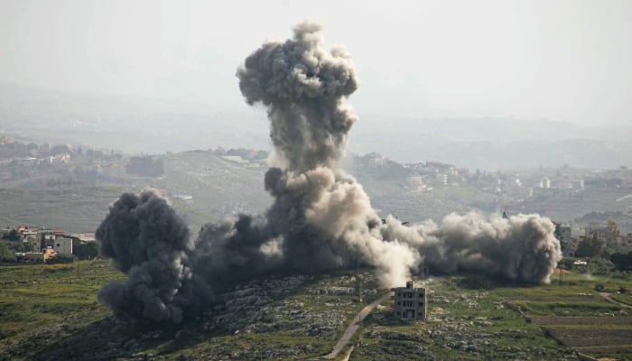 Smoke rises from the site of an Israeli airstrike that targeted the village of Deir El Zahrani, southern Lebanon, on May 13, 2026. — AFP