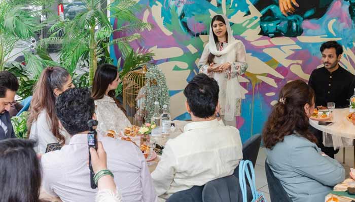 Malala Yousufzai addresses a gathering of influential Pakistanis gathered to discuss ways to improve Pakistan's education system. — Betty Laura Zapata for the Malala Fund