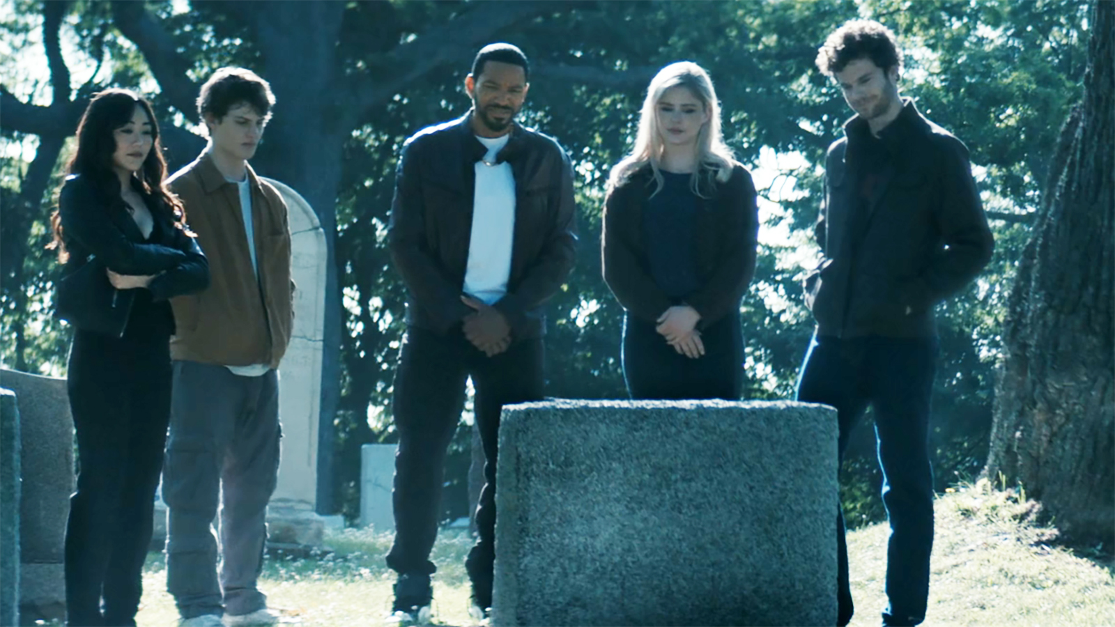 Kimiko, Ryan, Mother's Milk, Starlight and Hughie standing and looking at Butcher's grave in episode 8 of season 5 of The Boys