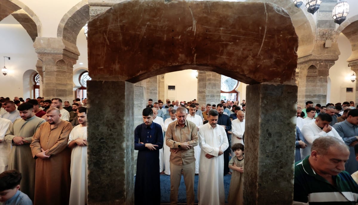 Muslim worshipers attend Eid ul Adha prayers in Mosul, Iraq, May 27, 2026. — Reuters