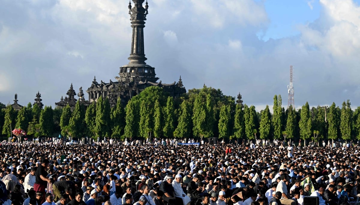 Muslim worshipers pray for Eid ul Adha, or the festival of sacrifice, in Denpasar, on the Indonesian resort island of Bali, May 27, 2026. — AFP
