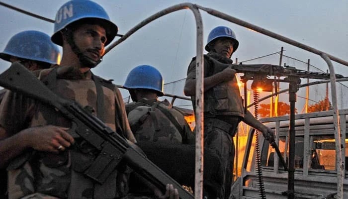 Pakistani peacekeepers patrol near the headquarters of the United Nations Force in Côte d'Ivoire (UNOCI) in Abidjan. — AFP/File