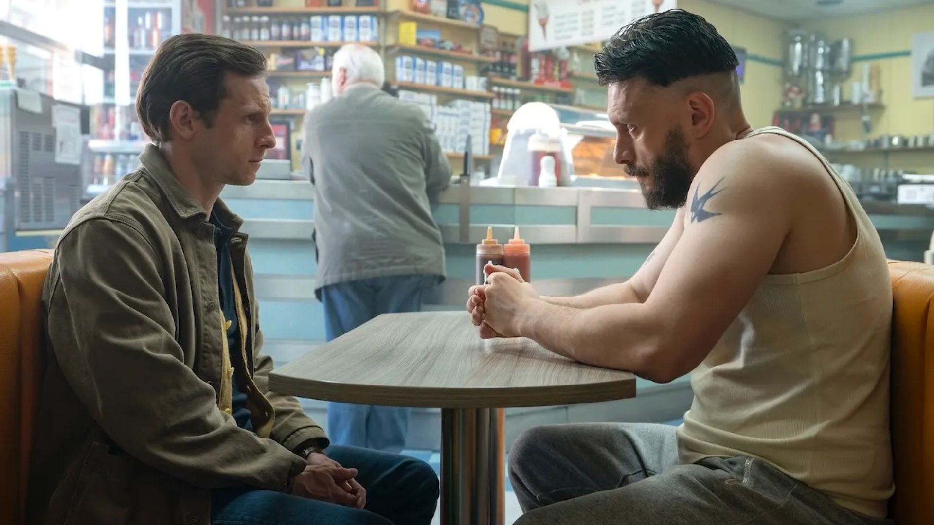 Jamie Bell and Richard Gadd chat at a restaurant table