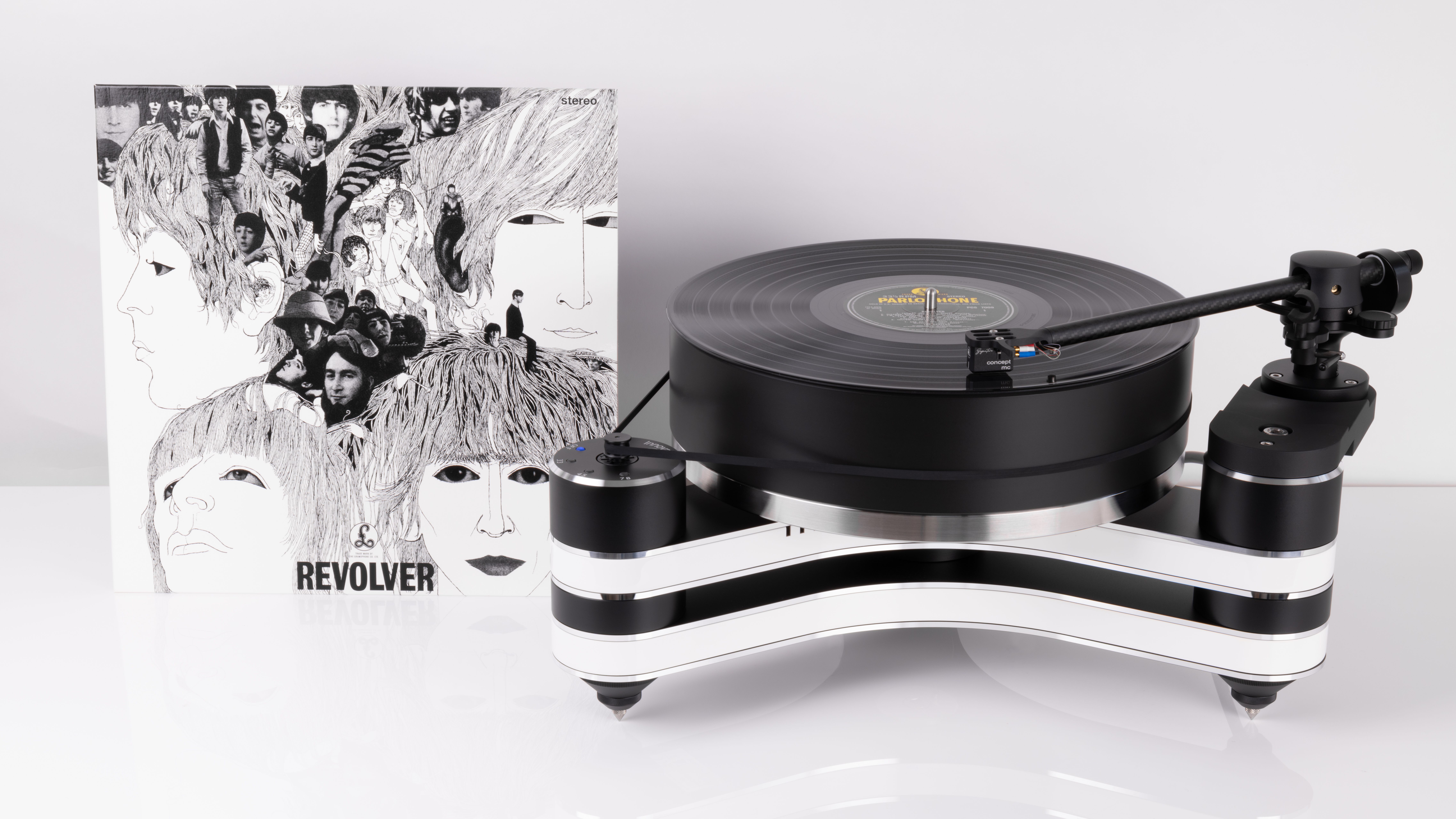Innovation Revolver Beatles turntable from Clearaudio, with the vinyl album in outline, on white background