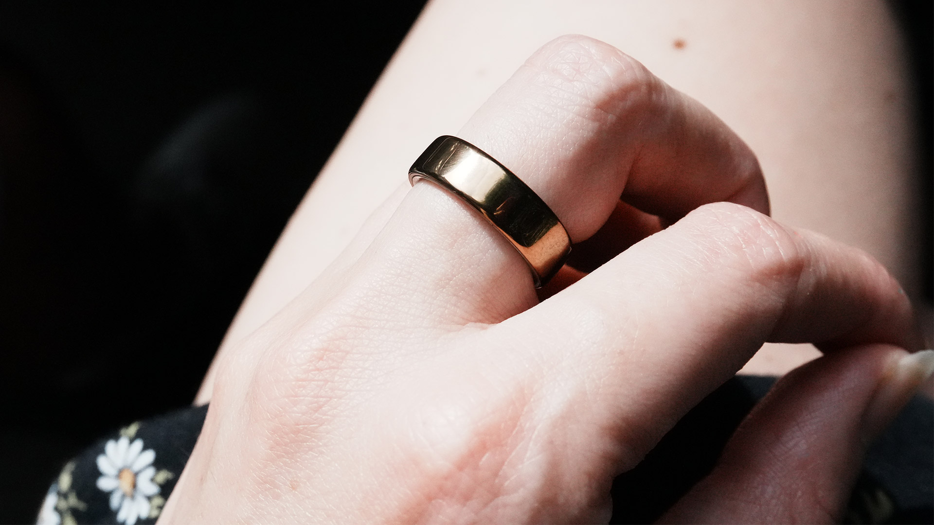 Close-up of a hand wearing the Oura Ring 5