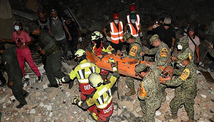 A photo released by the Mexican army shows the rescue of a nine-year-old boy in an area hit by two earthquakes in the state of La Guaira, Venezuela, June 28, 2026. — AFP