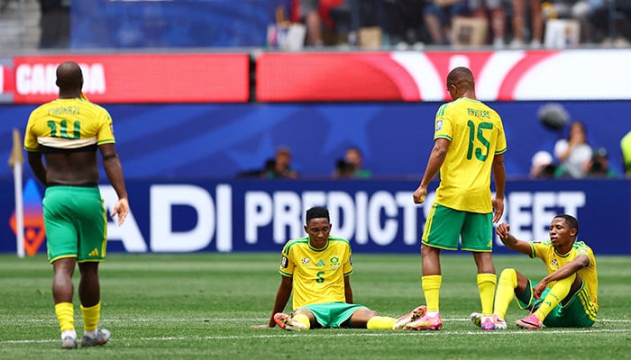 South Africans Thalente Mbatha and his teammate look dejected after the match as South Africa are eliminated from the World Cup. — Reuters/File
