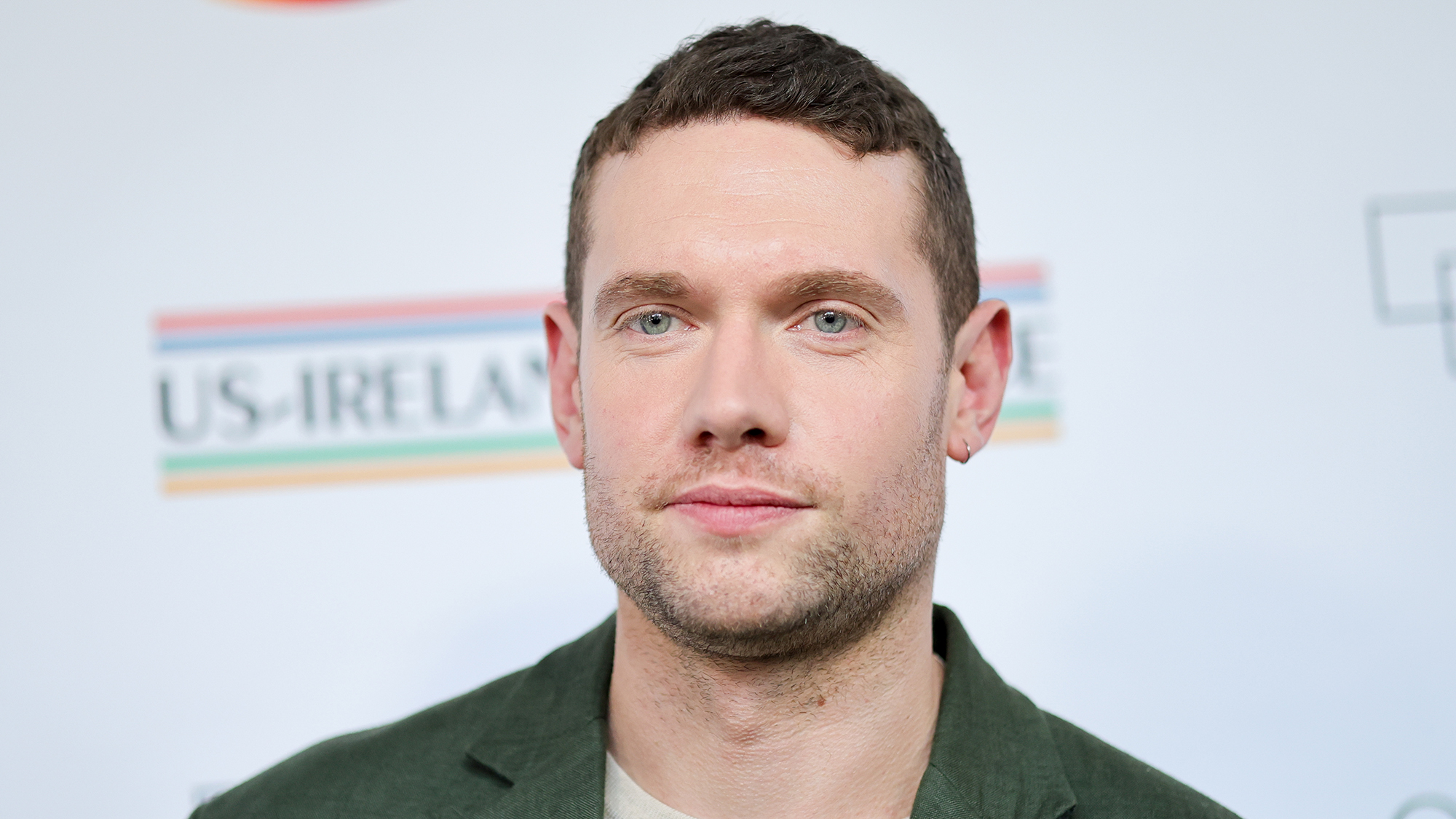 Tom Brittney posing for photos at an event