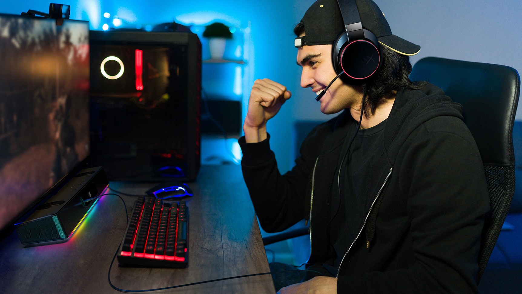 Lifestyle photo of a gamer using Creative Sound Blaster Katana V2X