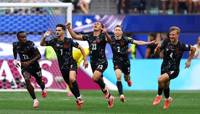 Canada's Stephen Eustaquio celebrates his first goal with his teammates. — Reuters/File
