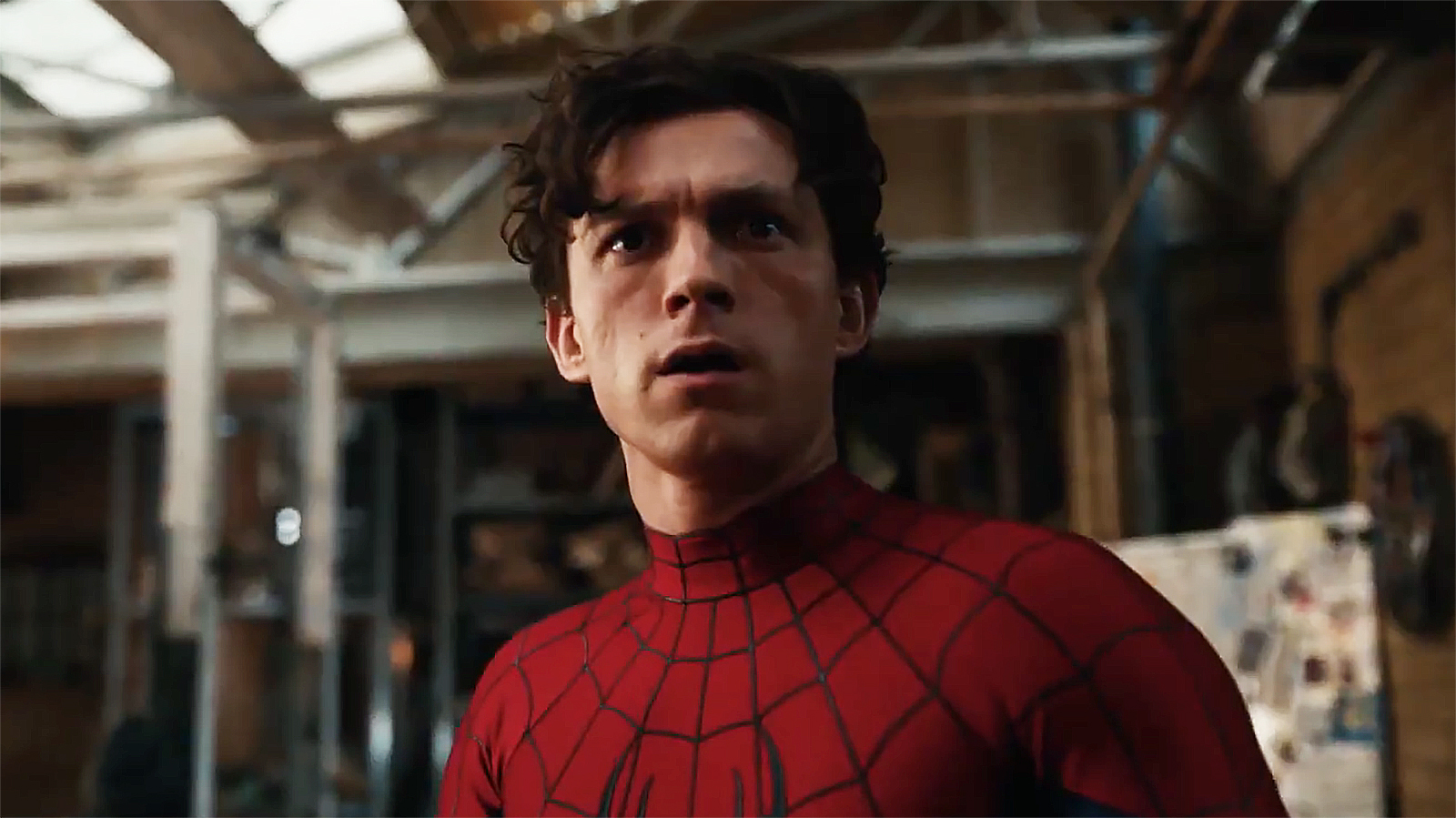 Tom Holland's Peter Parker looks confused while wearing his superhero costume in Spider-Man: Brand New Day