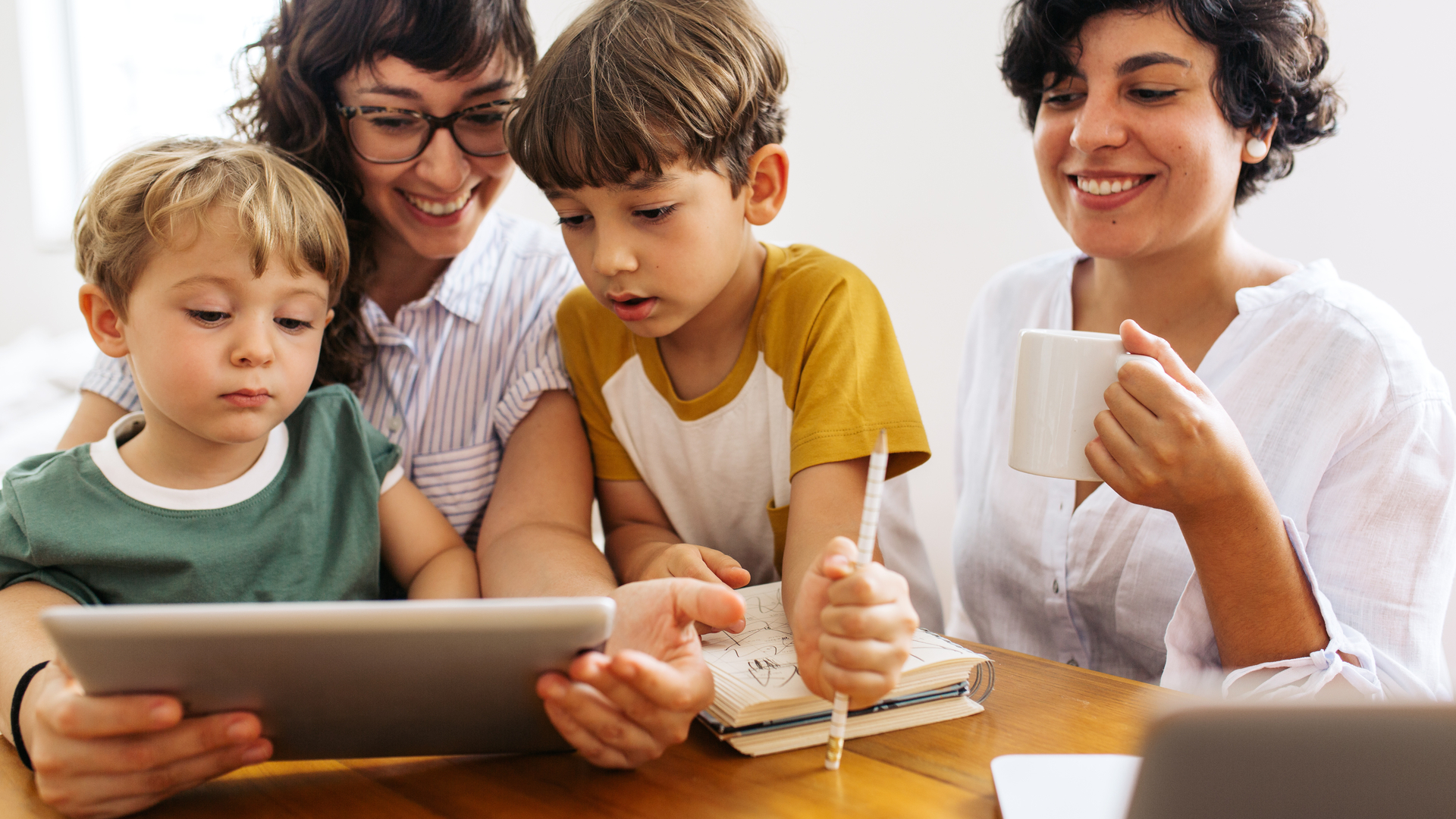 Family watching YouTube content on tablet