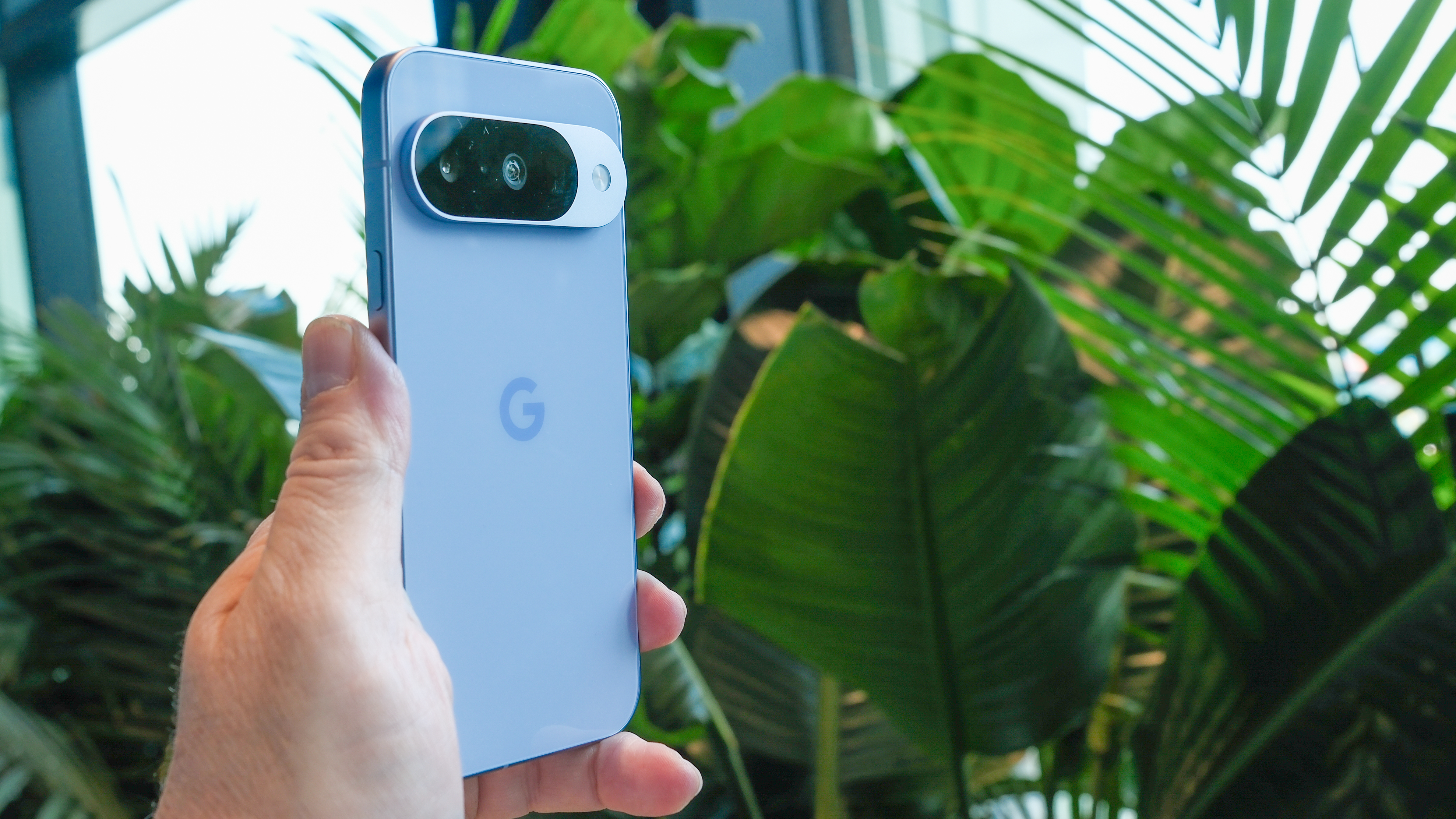 Google Pixel 10 in hand frost