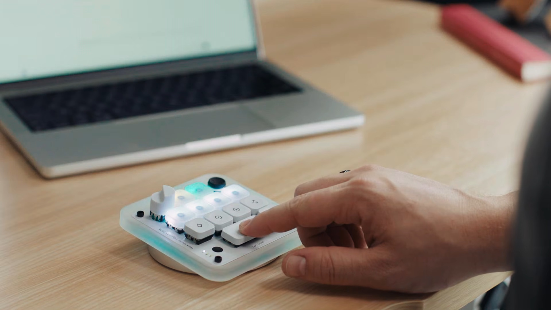 Codex Micro used with a person pressing the mic button