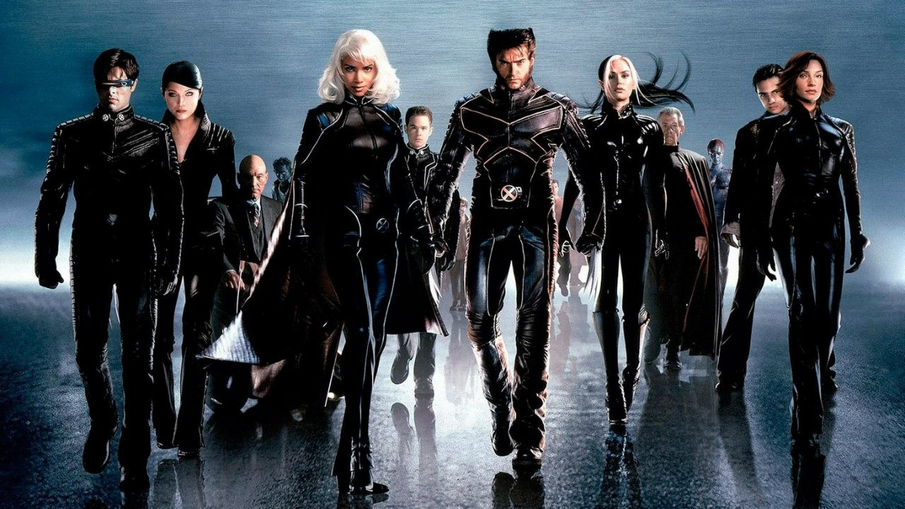 A press image showing the X-Men walking towards the screen in their 2000 film
