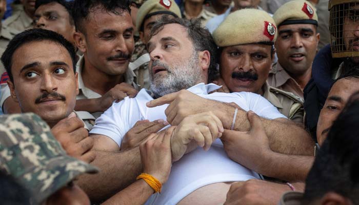 Indian opposition leader Rahul Gandhi is arrested by police during a sit-in outside Prime Minister Narendra Modi's residence, demanding accountability for police actions against students, in New Delhi, India, July 21, 2026. — Reuters