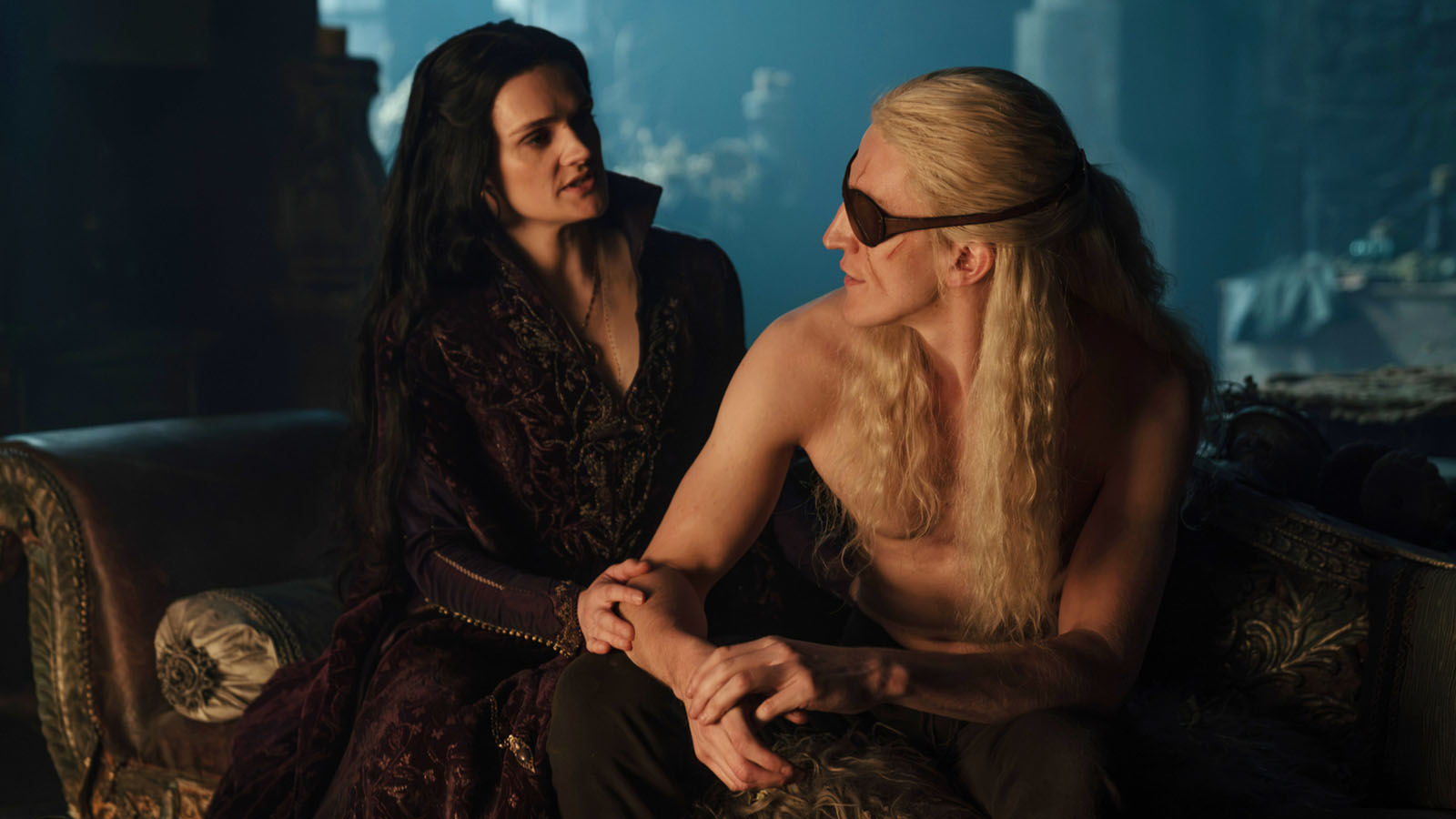 Alys and Aemond look at each other in a dark, candlelit room in House of the Dragon season 3 episode 6