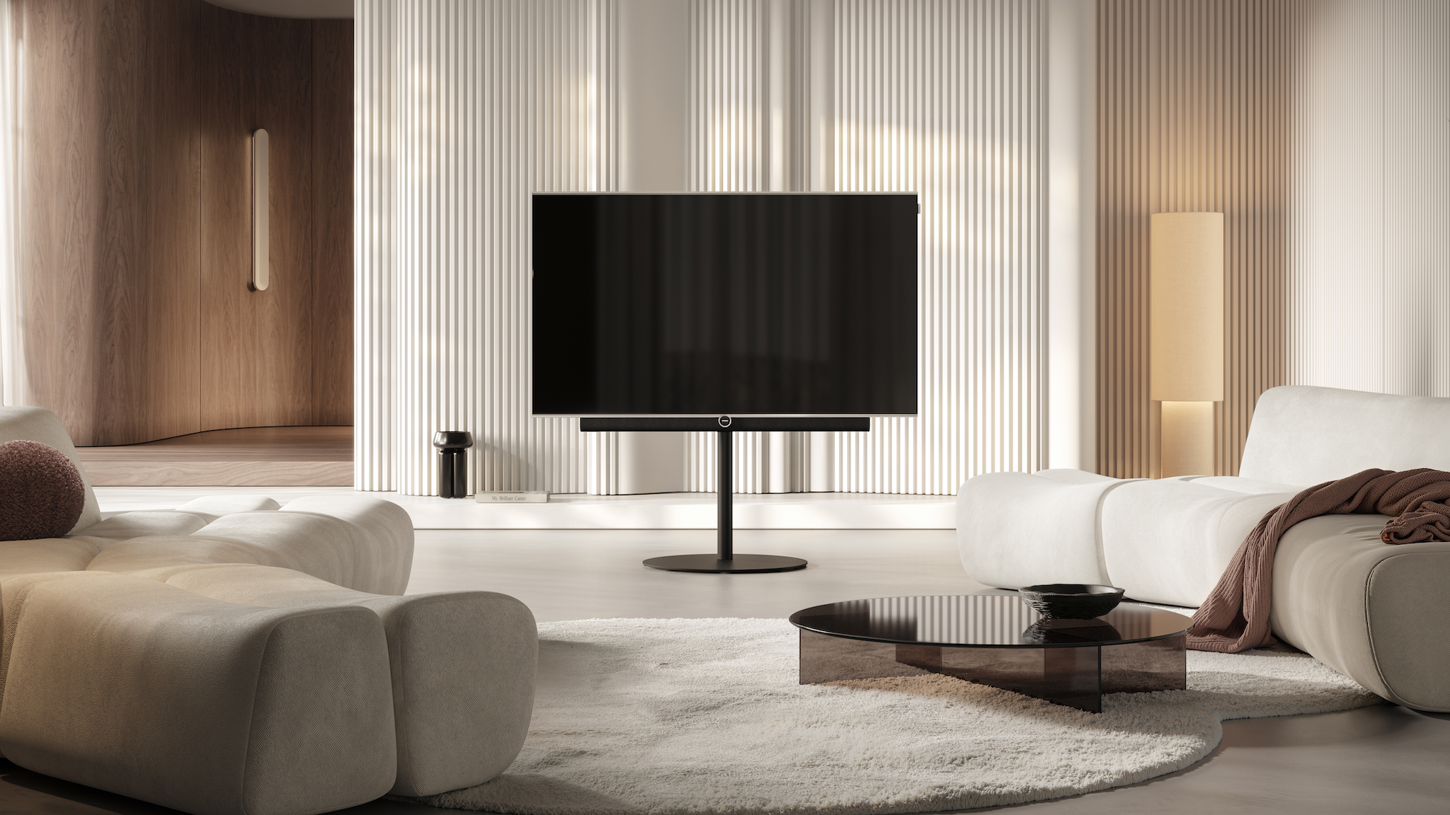 Lifestyle image of the Loewe Antares television in a neutrally decorated living room